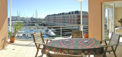 Sunny terrace with view over the Marina.